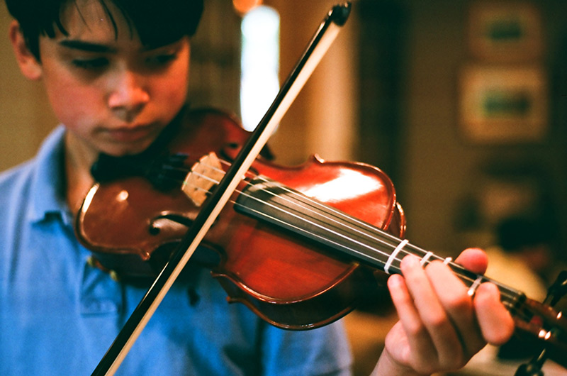 handsome boy with violin