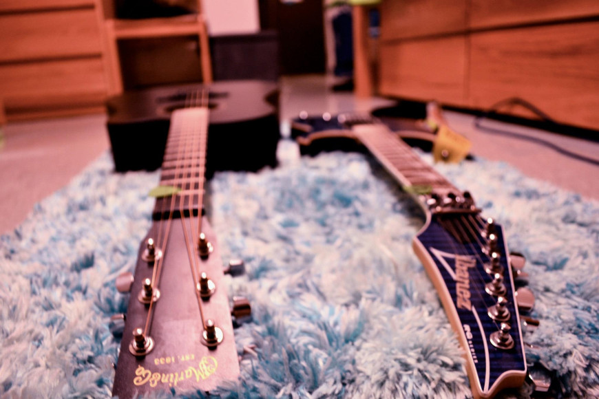 Martin acoustic guitar and Ibanez electric guitar