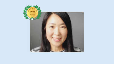 Image of Chiwon Chon with her 2025 Teacher of the Year for Korean badge