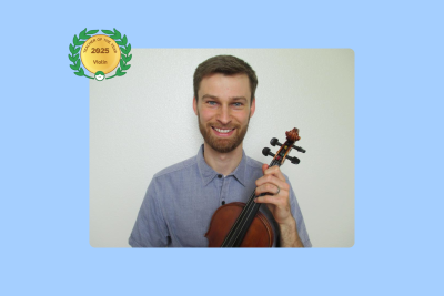 Image of Benjamin Henson with a violin