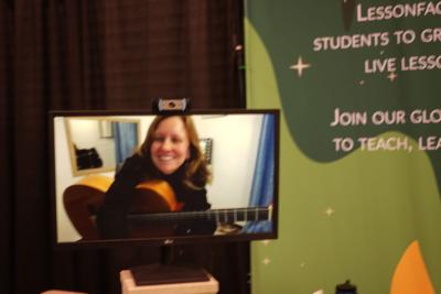 Leah Guitar Teacher and Host at Lessonface Open Mic Smiles Big