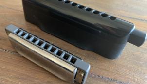 Two different types of harmonicas.