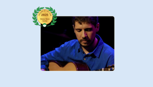 Image of João Vasconcelos playing the guitar on stage during a performance with his Lessonface Teacher of the Year in Bossa Nova Guitar badge